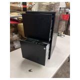 Locking metal filing cabinet with keys