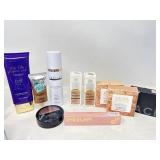 Assorted cosmetics, foundation, blush, contour,