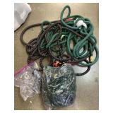 Lot of assorted water hoses includes 3 different