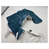 Heated weighted neck and shoulder pad tested