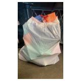 13 gallon trash bag full of Amazon basics lotion