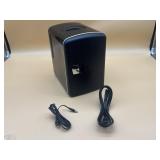 Mini fridge with wall and car cords in like