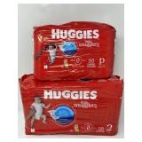 New Lot of Huggies Diapers, Includes Newborn