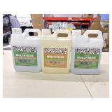 Three containers of mulch glue