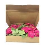 Box filled with fake arrangement pink roses for