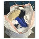 13 gallon trash bag or assorted clothing,