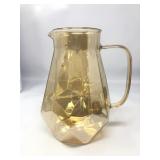 Diamond cut glass pitcher