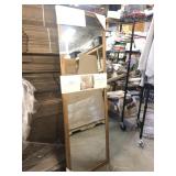 Large standing pine mirror the back is broken in