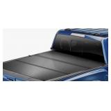 Tri-fold Truck Tonneau cover for unknown vehicle.