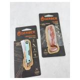 Gerber mini folding knife and mini multi tool.