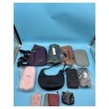 Lot of purses, backpacks, wallets, zipper pouches