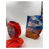 Tide pods and Purex oxi pods, both containers have