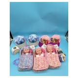 Lot of items for girls- hats, baby dolls, socks, a
