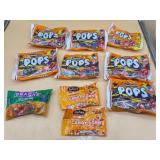 Assorted candy Tootsie roll pops and more