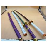 Two metal practice swords (not sharp) with sheaths