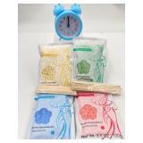 4- 3.5 oz bags of wax beads and a baby blue analog