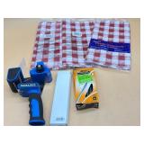 Plastic tablecloths, tape gun and more!