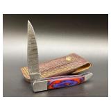 Damascus folding pocket knife with colorful wood h
