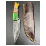 fixed-blade hunting and skinning knife featuring a