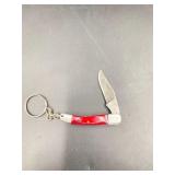 Damascus pocket knife keychain, such as the Wild T