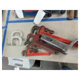 (2) Clamps, (4) Pipe Wrenches & Snow Chains