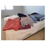 Twin Bed with Linens, Throws, Massager