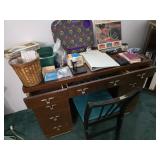 Desk, chair, contents as shown