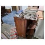Wooden wall cabinet,  handyman magazines, maps