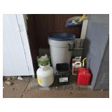 Rubbermaid trash can, gas can, propane tank
