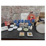 Coffee mugs, trays, marble cutting board, dishes,