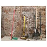 Yard rakes, limb pruner, various yard tools