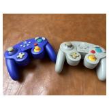 Two Nintendo Switch Controllers