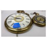 2 United Hanging Clocks