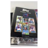 Binder Filled With Sports Items