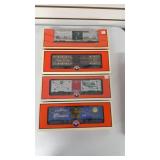 4 Lionel Christmas Edition Box Cars