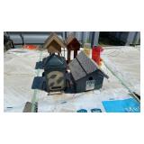 Lot Of Bird Feeders And Houses