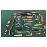 Assortment of Knives, Whistles, and U.S. Customs