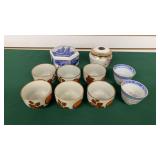 8 Cups and 2 Covered Tins