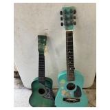 2 Child Plastic Guitars (Need Strings)