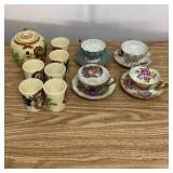 Tea Cups and Saucers and Tea Pot and Cups