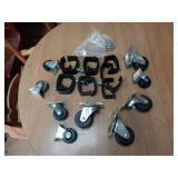 9 Small Casters & 6 Truck Cap Clamps