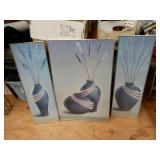 Three Pictures Depicting Vases Growing