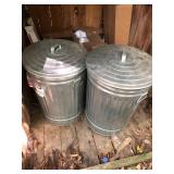 2 Garbage Cans- One has Small amount of corn