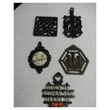 An Assortment of 5 Mostly Older Trivets