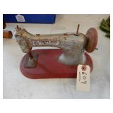 Pretty Maid Tin Childs Sewing Machine