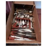 Quantity of Silverware From China Cabinet