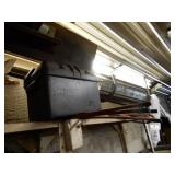 Plastic Battery Box, Pipe Above, Florescent Lights