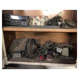 Two Wooden Shelves On Wall With Contents