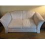 White with floral design love seat.