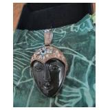 Vintage Art Deco Black Glass Face Pendant with Rhinestone Crown